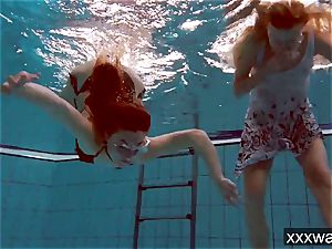warm Russian women swimming in the pool
